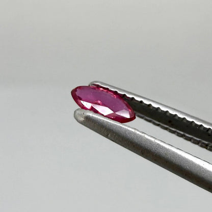 0.13 ct marquise-cut vivid pink-red ruby from Myanmar, eye-clean appearance
