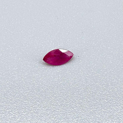 A faceted marquise-cut pink ruby from Myanmar, 0.16 ct, eye-clear to slightly silky appearance  with fine natural inclusions