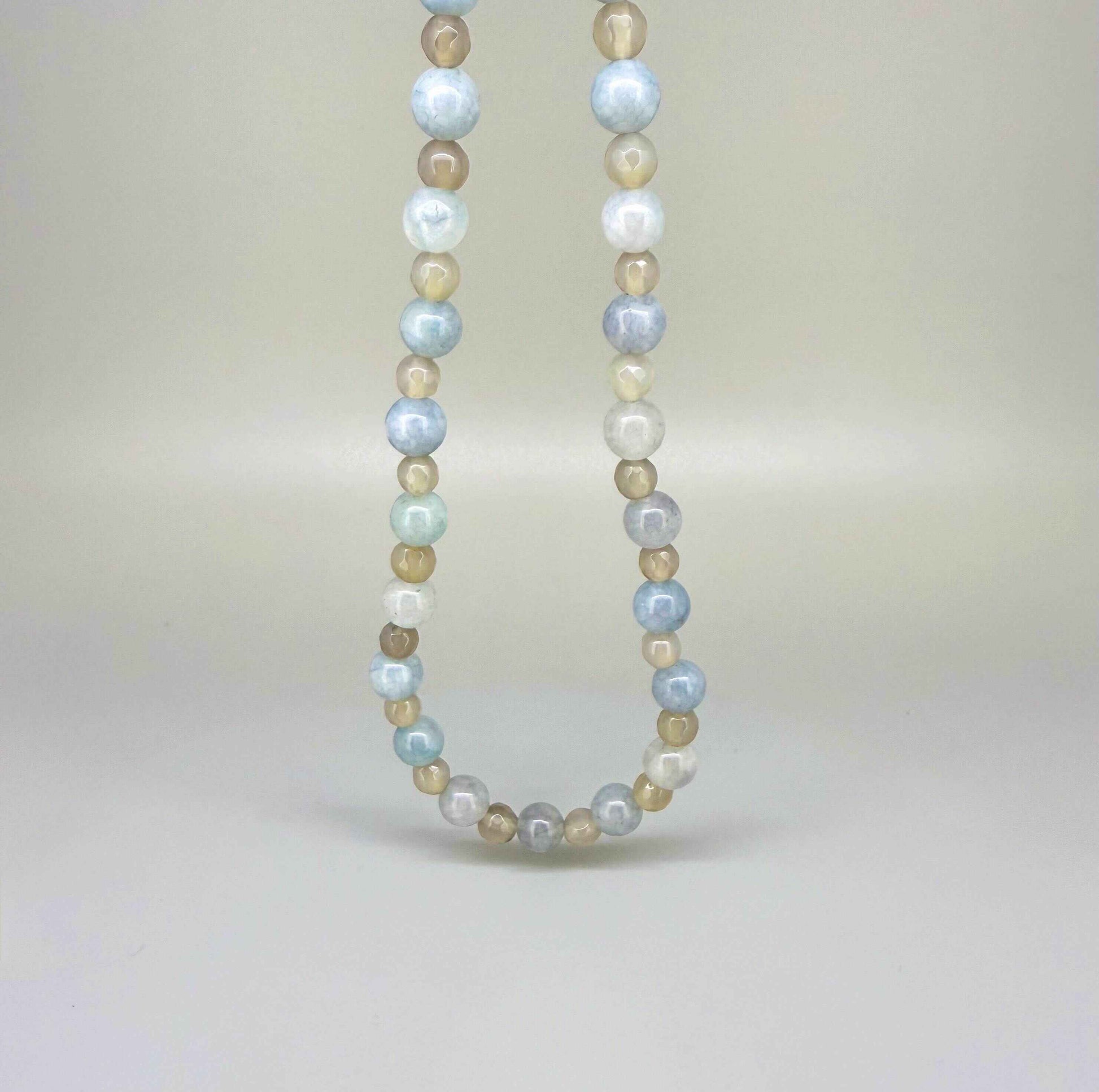 Handcrafted 43 cm agate beaded necklace in soft blue, beige, and cream tones, featuring a mix of matte and polished round beads.