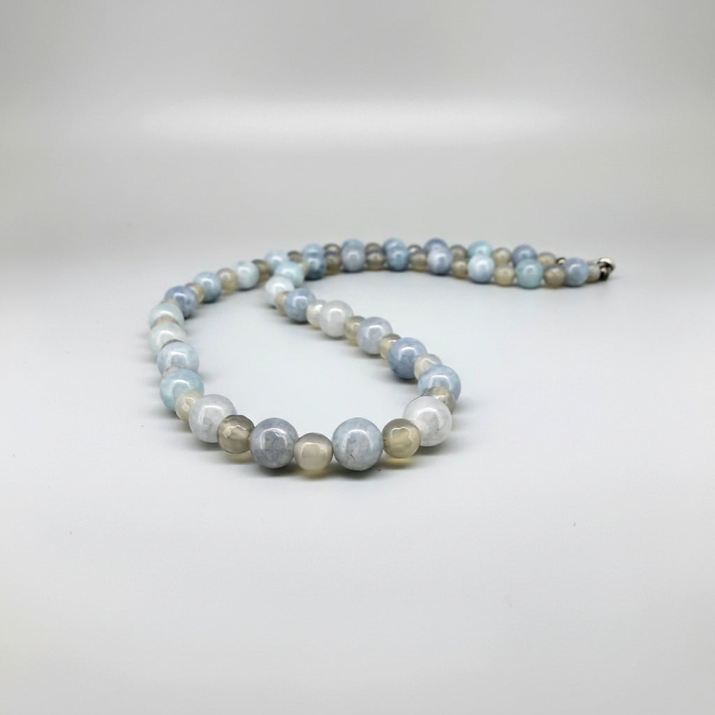 Handcrafted 43 cm agate beaded necklace in soft blue, beige, and cream tones, featuring a mix of matte and polished round beads.