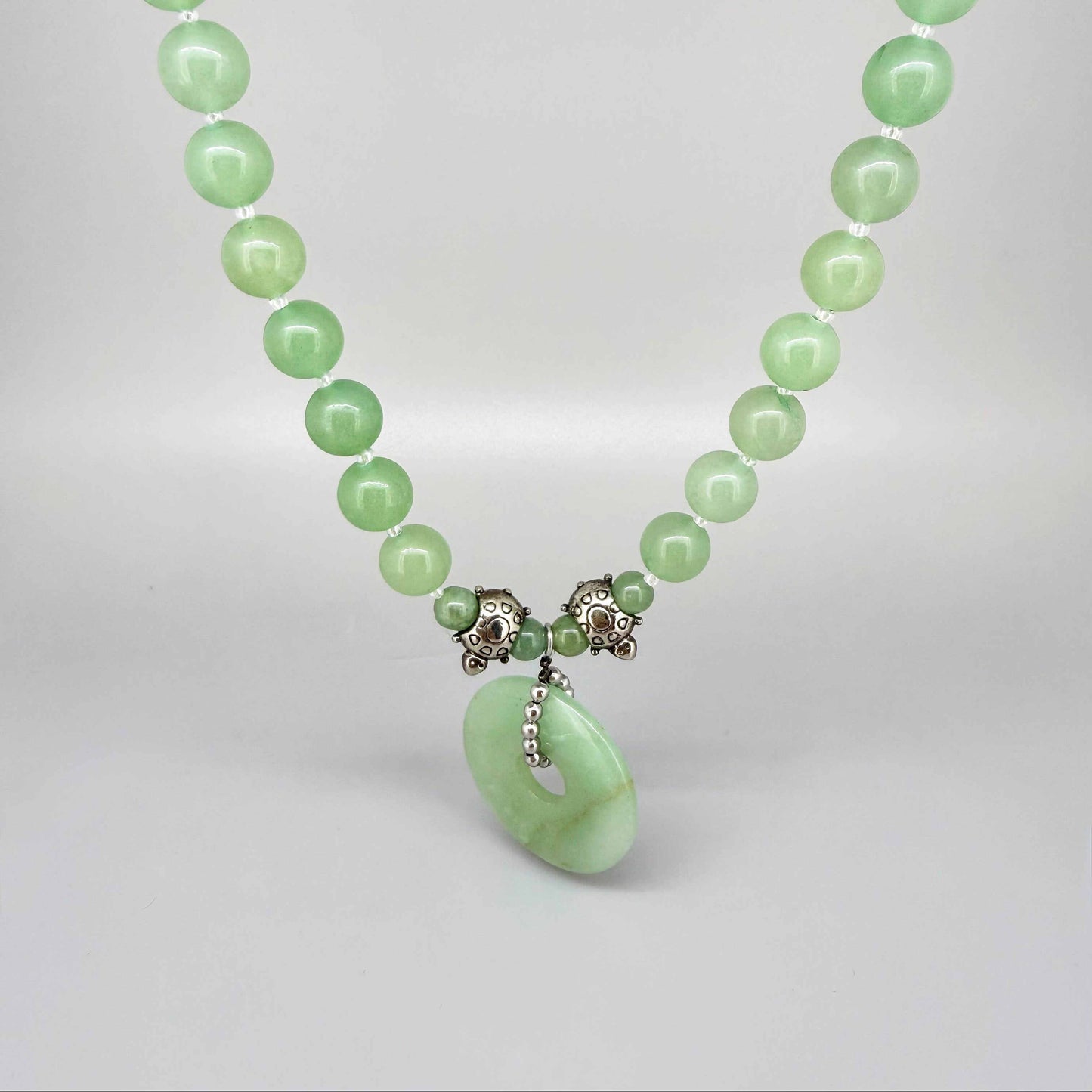 Handmade aventurine necklace, 46 cm / 18.1 in, featuring green gemstone beads and a matching pendant with metal details.