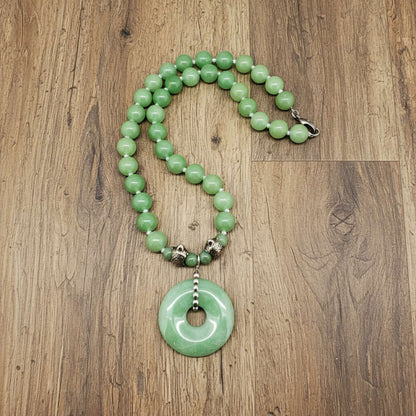 Handmade aventurine necklace, 46 cm / 18.1 in, featuring green gemstone beads and a matching pendant with metal details.