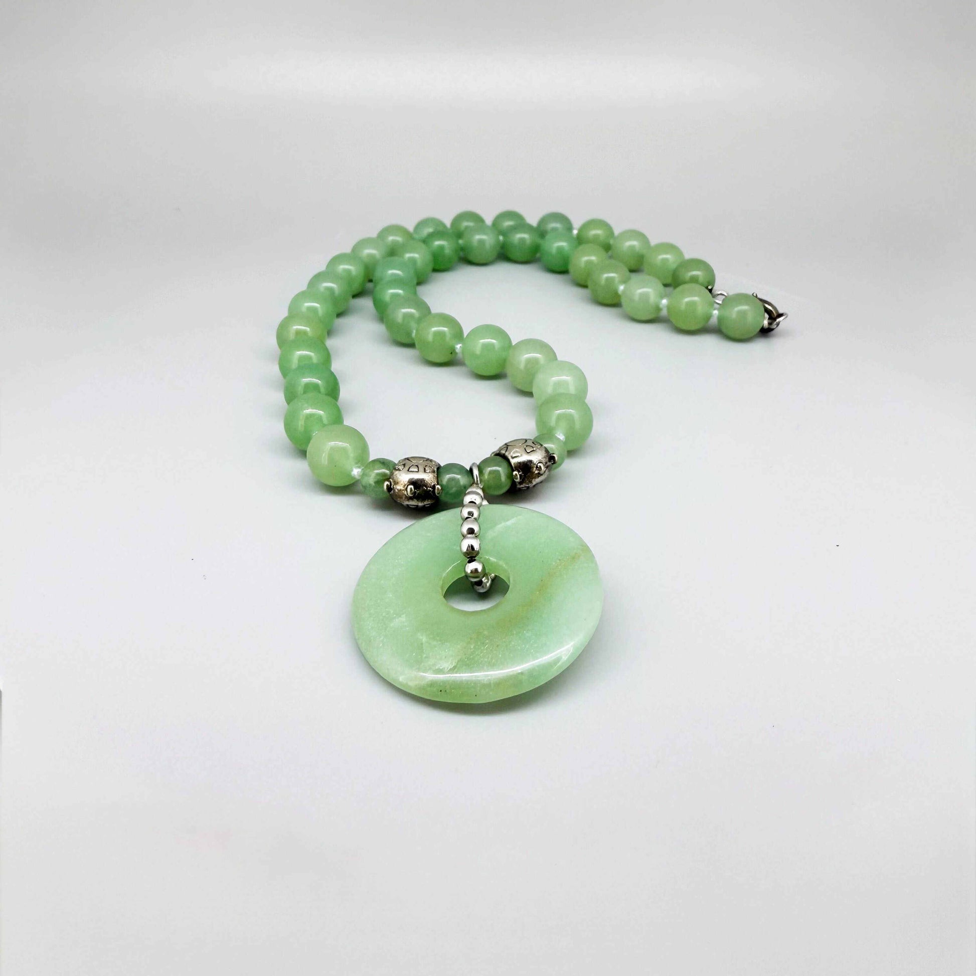 Handmade aventurine necklace, 46 cm / 18.1 in, featuring green gemstone beads and a matching pendant with metal details.