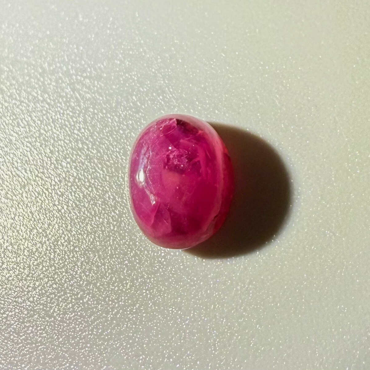 4.62 ct natural pink Star Ruby cabochon from Madagascar with soft star effect and polished dome.