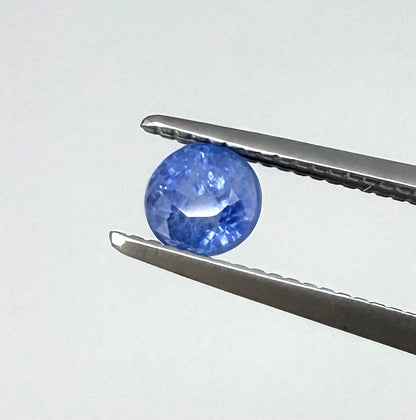 0.52 ct natural sky-blue sapphire, round cut.