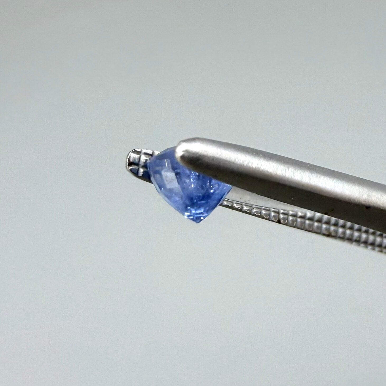 0.52 ct natural sky-blue sapphire, round cut.