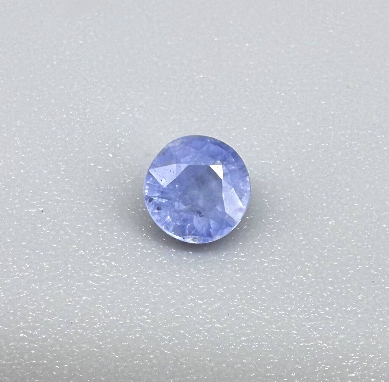 0.6 ct natural sky-blue sapphire, round