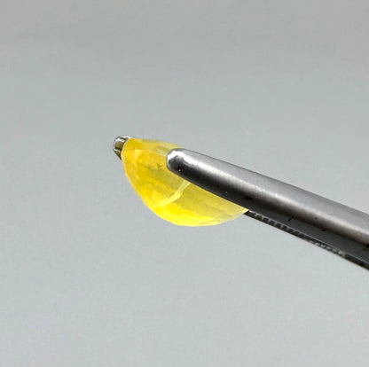 0.84 ct natural yellow opal from Africa, polished gemstone.
