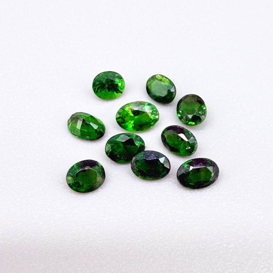 Lot of natural vibrant-green diopside stones, trillion cut, total weight 1.6 ct.