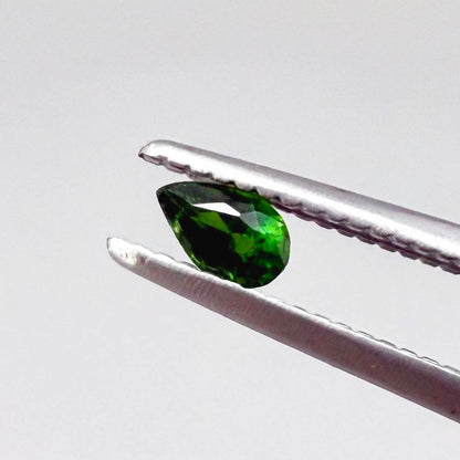 0.14 ct natural green diopside, pear cut.