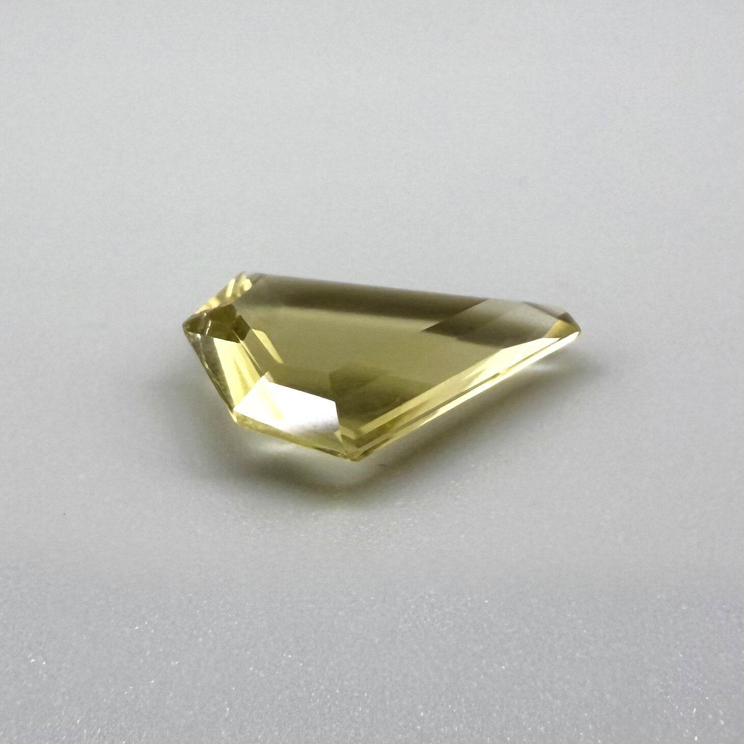 7.87 ct natural lemon quartz, fancy cut, bright yellow color.