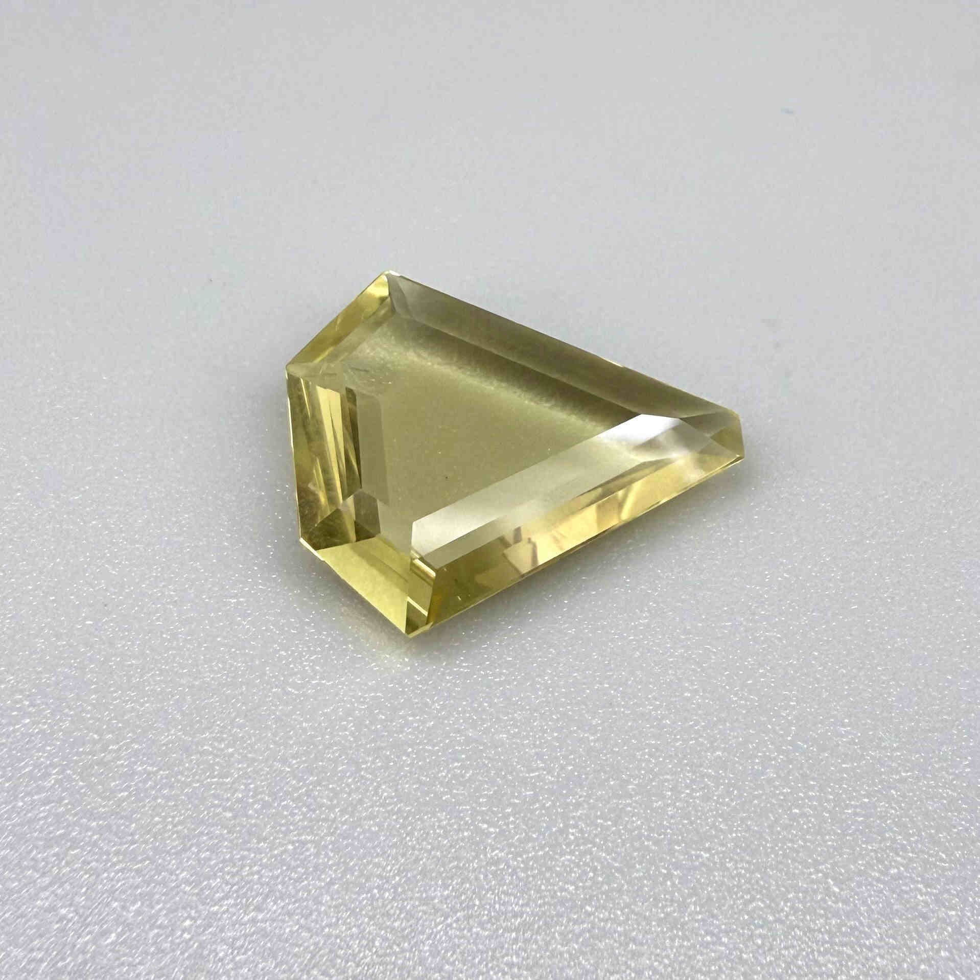 7.87 ct natural lemon quartz, fancy cut, bright yellow color.