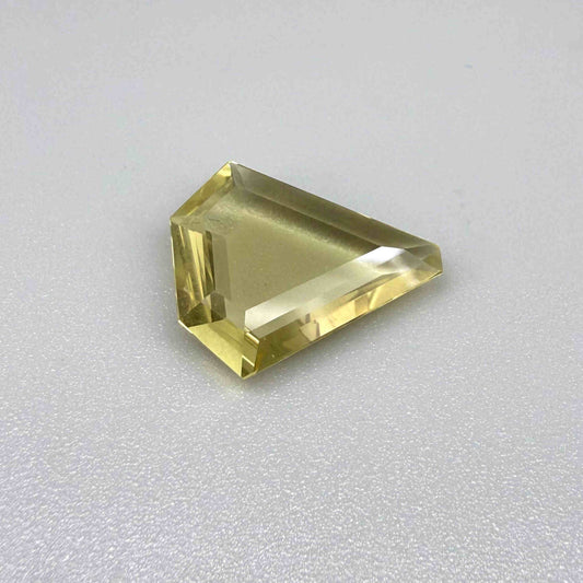 7.87 ct natural lemon quartz, fancy cut, bright yellow color.