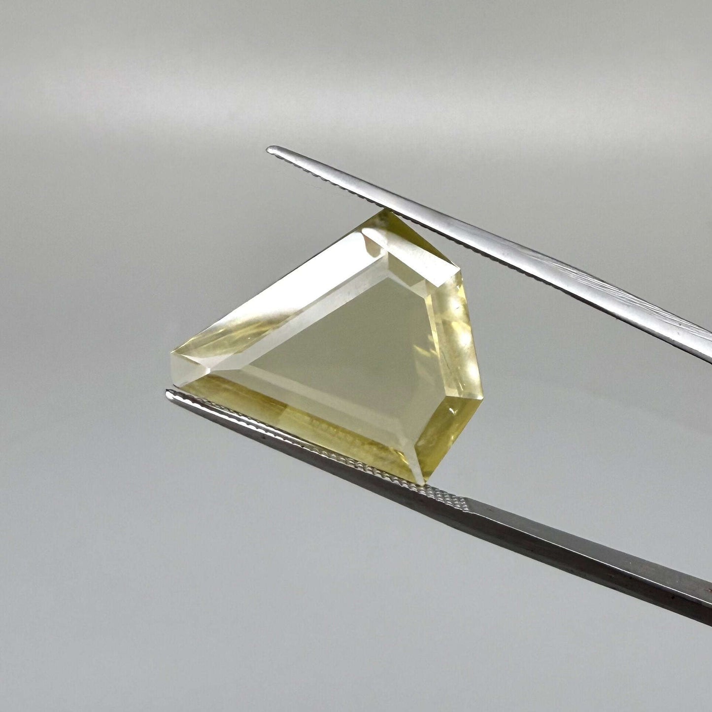 7.87 ct natural lemon quartz, fancy cut, bright yellow color.