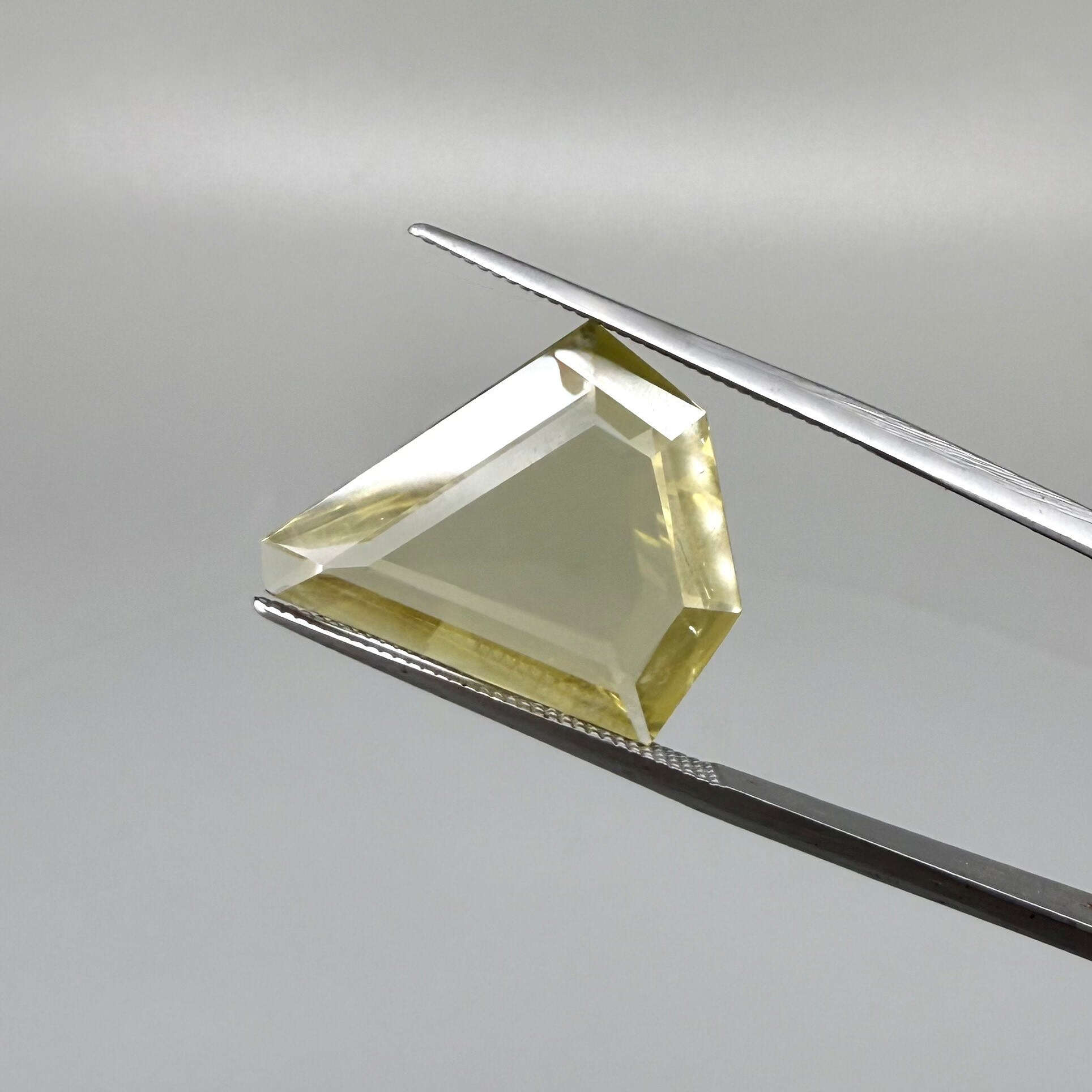 7.87 ct natural lemon quartz, fancy cut, bright yellow color.