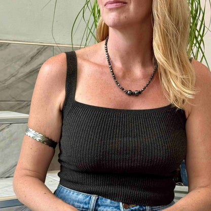 Hematite beaded necklace, 45 cm / 17.7 in long, with polished metallic grey stones and larger statement center beads.