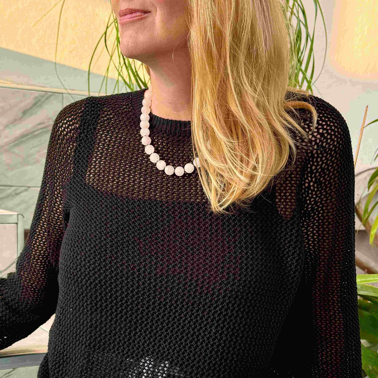 Matte rose quartz beaded necklace, 44 cm long, featuring softly polished natural rose quartz spheres in pale pink tones.