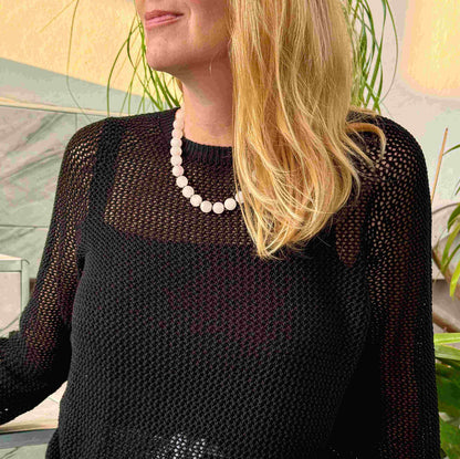 Matte rose quartz beaded necklace, 44 cm long, featuring softly polished natural rose quartz spheres in pale pink tones.