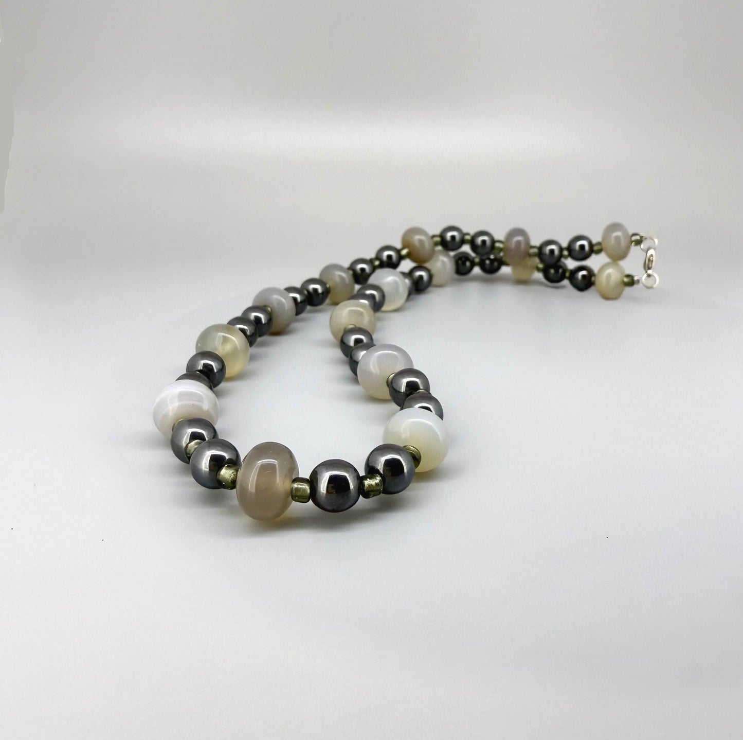 Quartz and hematite necklace, 44 cm / 17.3 in, featuring alternating clear quartz and metallic grey hematite beads.