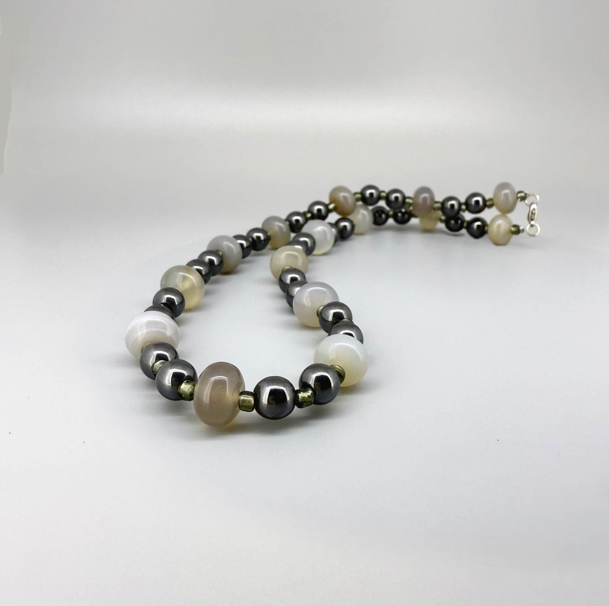 Quartz and hematite necklace, 44 cm / 17.3 in, featuring alternating clear quartz and metallic grey hematite beads.