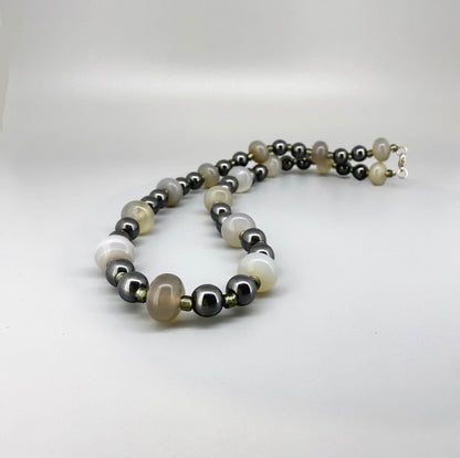 Quartz and hematite necklace, 44 cm / 17.3 in, featuring alternating clear quartz and metallic grey hematite beads.