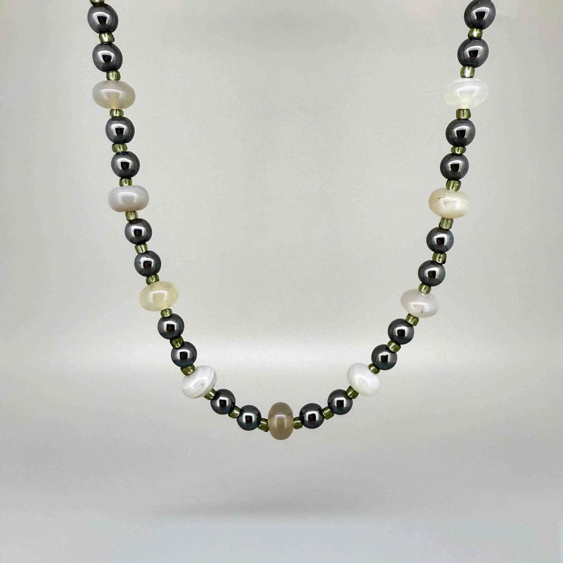 Quartz and hematite necklace, 44 cm / 17.3 in, featuring alternating clear quartz and metallic grey hematite beads.