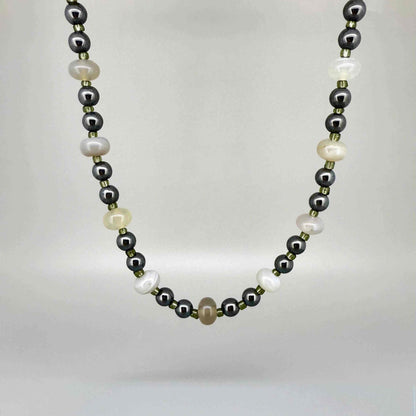 Quartz and hematite necklace, 44 cm / 17.3 in, featuring alternating clear quartz and metallic grey hematite beads.