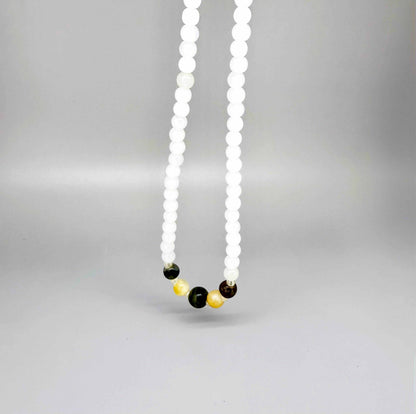 White jade beaded necklace with warm-toned center accents, 43 cm / 16.9 in.