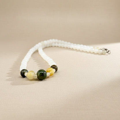 White jade beaded necklace with warm-toned center accents, 43 cm / 16.9 in.