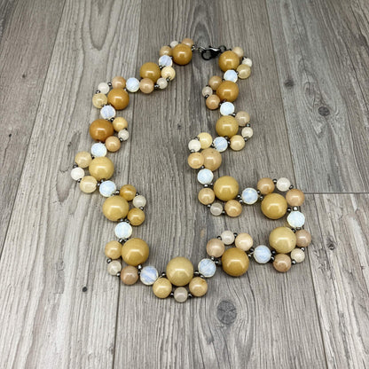 Handcrafted 41 cm necklace made from yellow jade and white opal beads in golden-yellow and ivory tones, featuring smooth round gemstones in varying sizes.