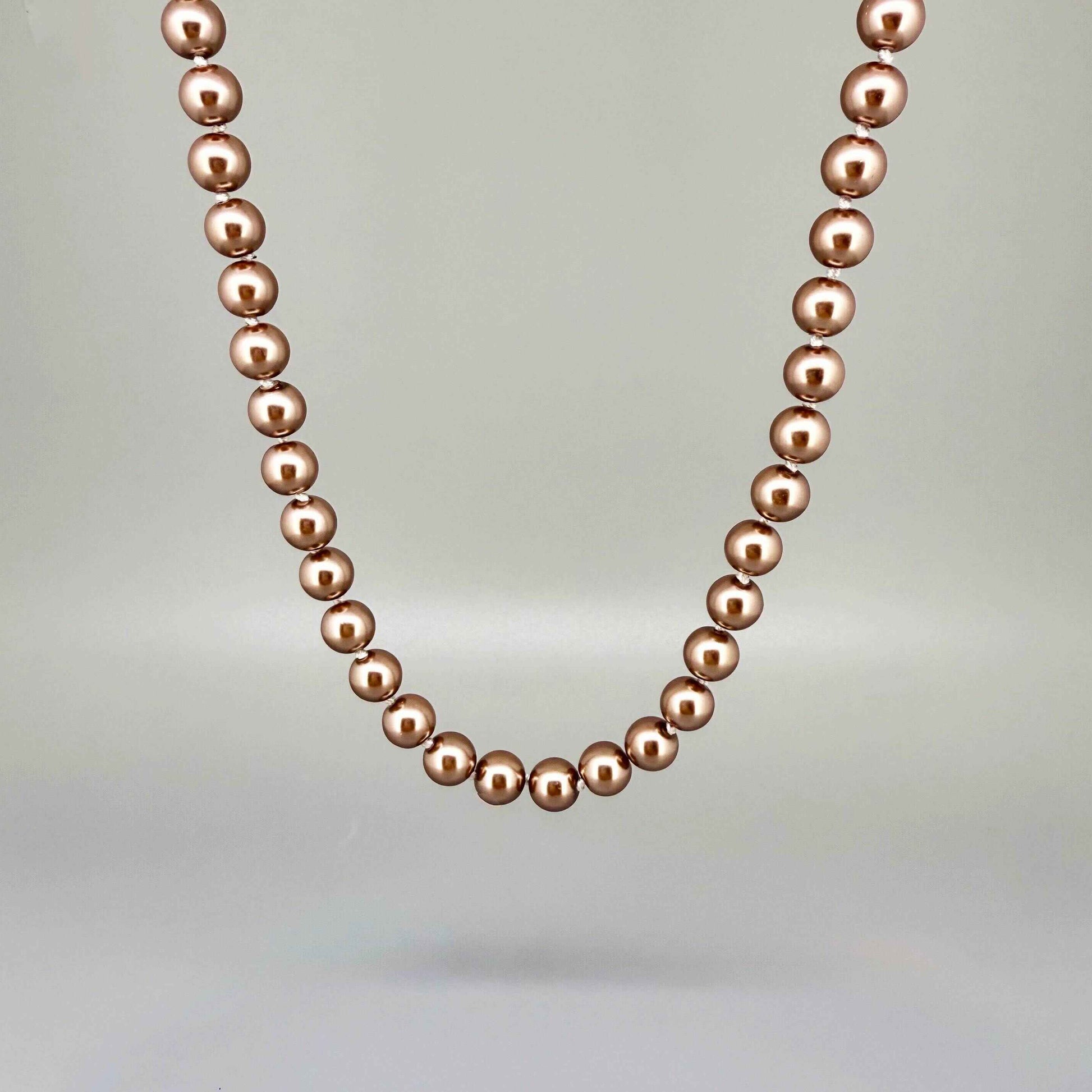 Rose-gold imitation pearl necklace, 45 cm / 17.7 in, featuring round polished beads with a refined luster.
