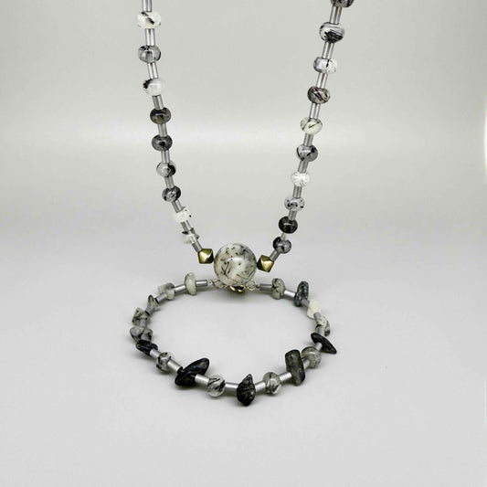 Rutilated quartz and hematite jewelry set with 52 cm necklace and 20 cm bracelet