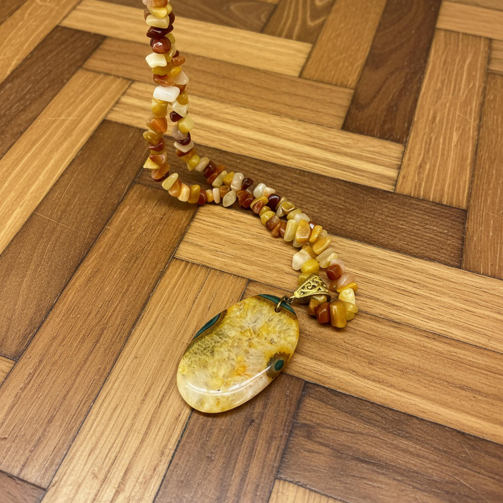 Handmade jade and agate beaded necklace and bracelet set in yellow, amber, and honey tones with polished jade pendant.
