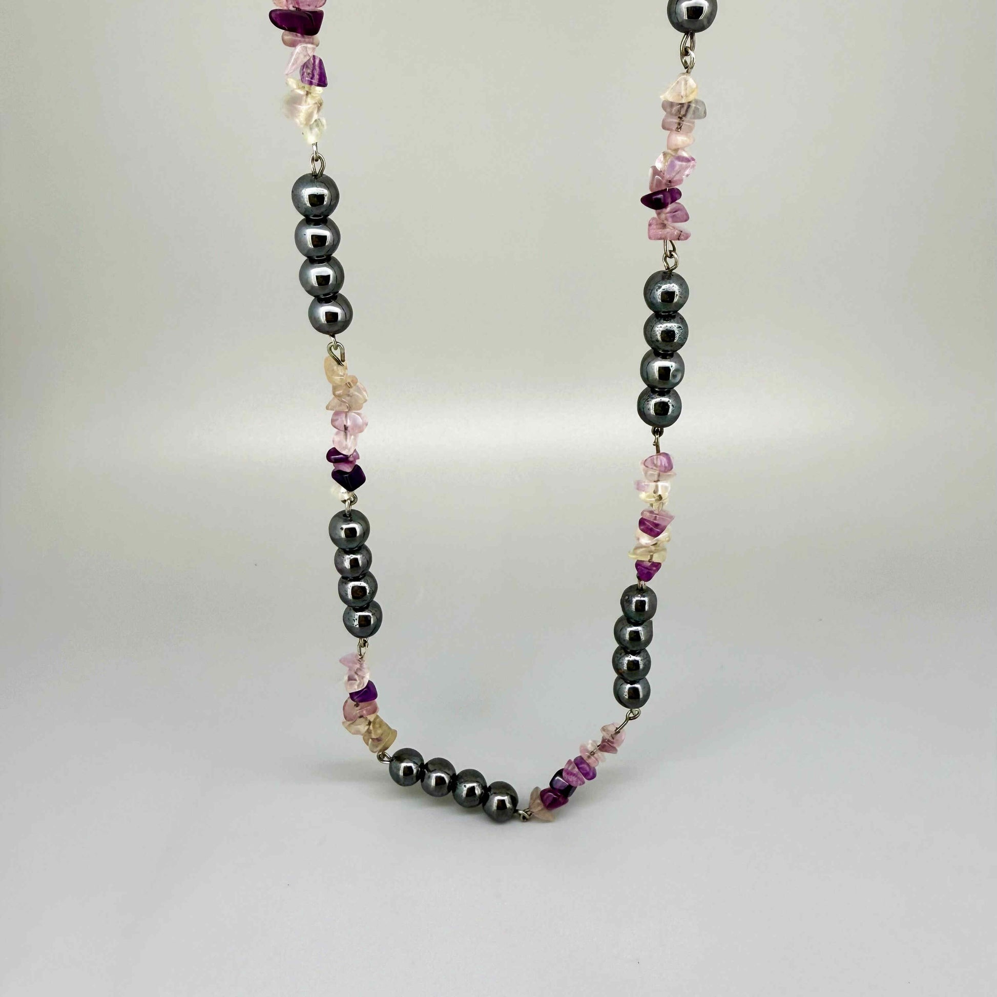Handcrafted hematite and fluorite necklace in metallic silver-grey with pastel accents, 50 cm.