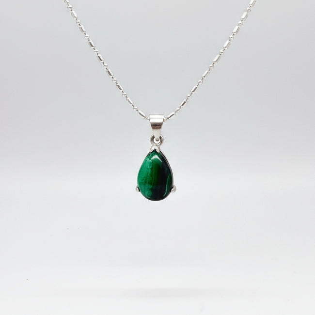 Sterling silver pendant featuring a 6.38 ct natural malachite with deep green banding.