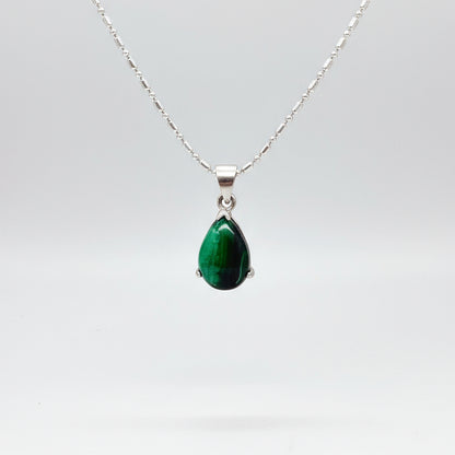 Sterling silver pendant featuring a 6.38 ct natural malachite with deep green banding.
