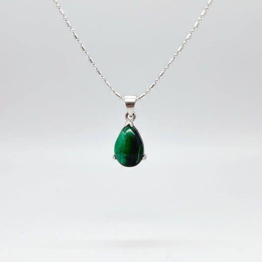 Sterling silver pendant featuring a 6.38 ct natural malachite with deep green banding.