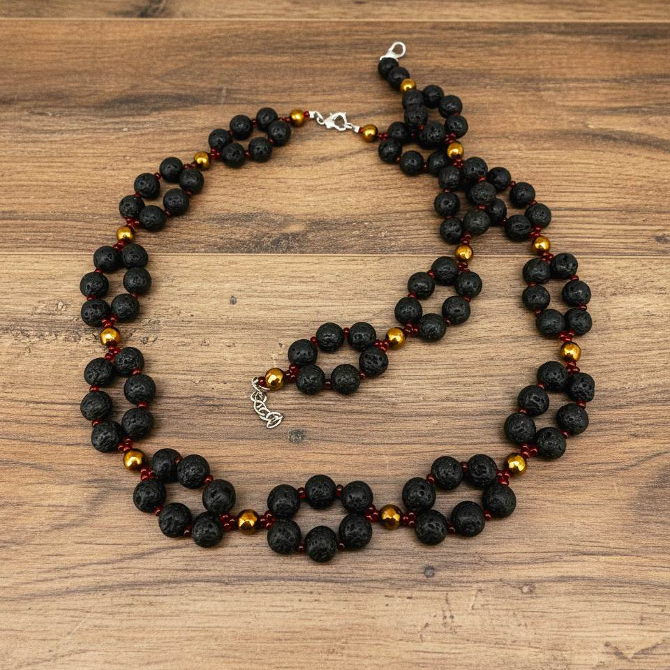 Handcrafted lava stone jewelry set with necklace, bracelet, and earrings in matte black and brown tones.