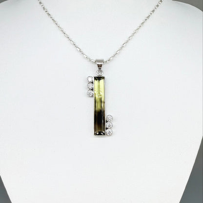 Handmade bicolor lemon quartz pendant in white-gold-plated silver, 6.42ct, with CZ accents. Yellow-to-honey tones, elegant and unique.