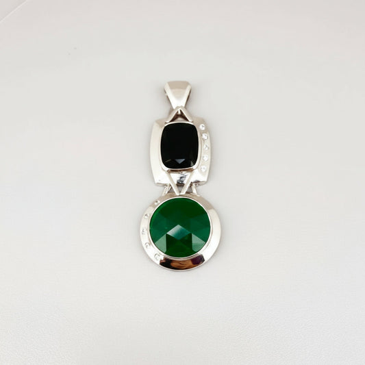 Handcrafted white-gold-plated silver pendant with two green chalcedony stones (16.47 ct total) in a modern geometric design.