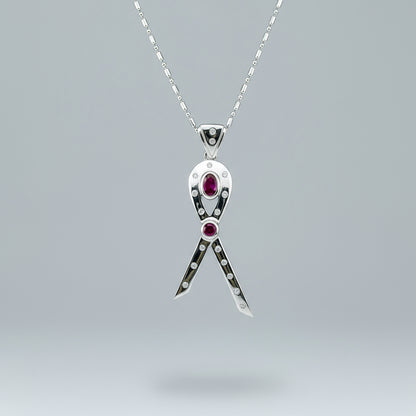 Modern handcrafted pendant in white-gold-plated silver with two natural rubies (1.73 ct total) and cubic zirconia accents