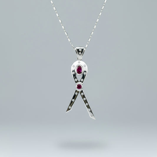 Modern handcrafted pendant in white-gold-plated silver with two natural rubies (1.73 ct total) and cubic zirconia accents