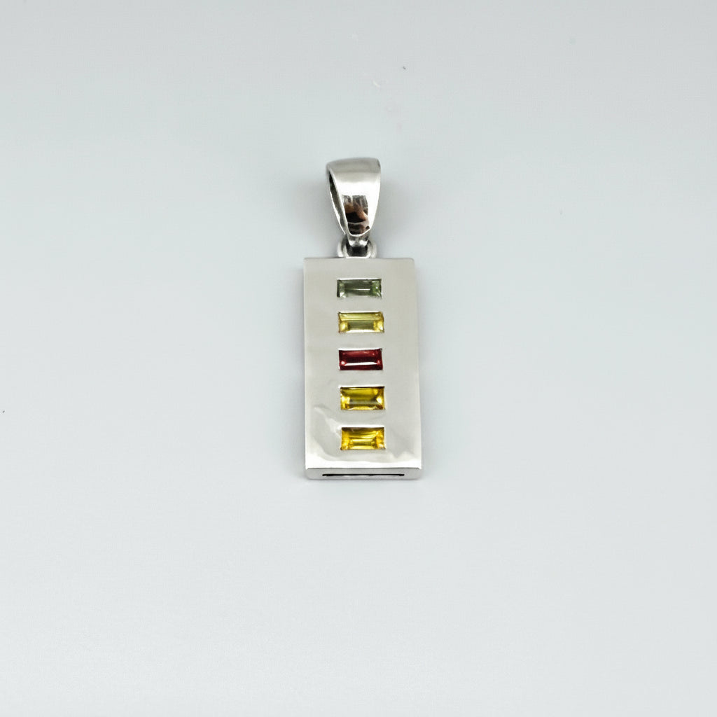 Handmade pendant featuring 0.8 ct fancy sapphires in yellow, pink, and blue, set in white-gold-plated sterling silver.