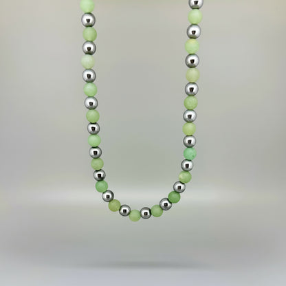 Handcrafted aventurine and hematite necklace in light green with metallic accents, 42 cm.