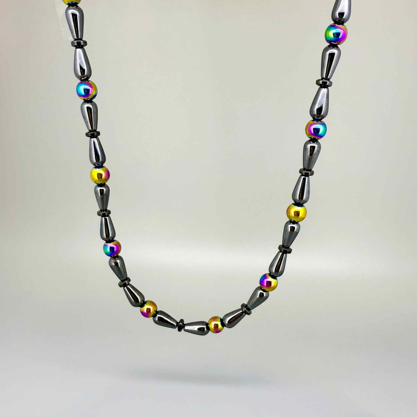 Hematite beaded necklace, 48 cm / 18.9 in long, featuring metallic grey stones with colorful accent beads.