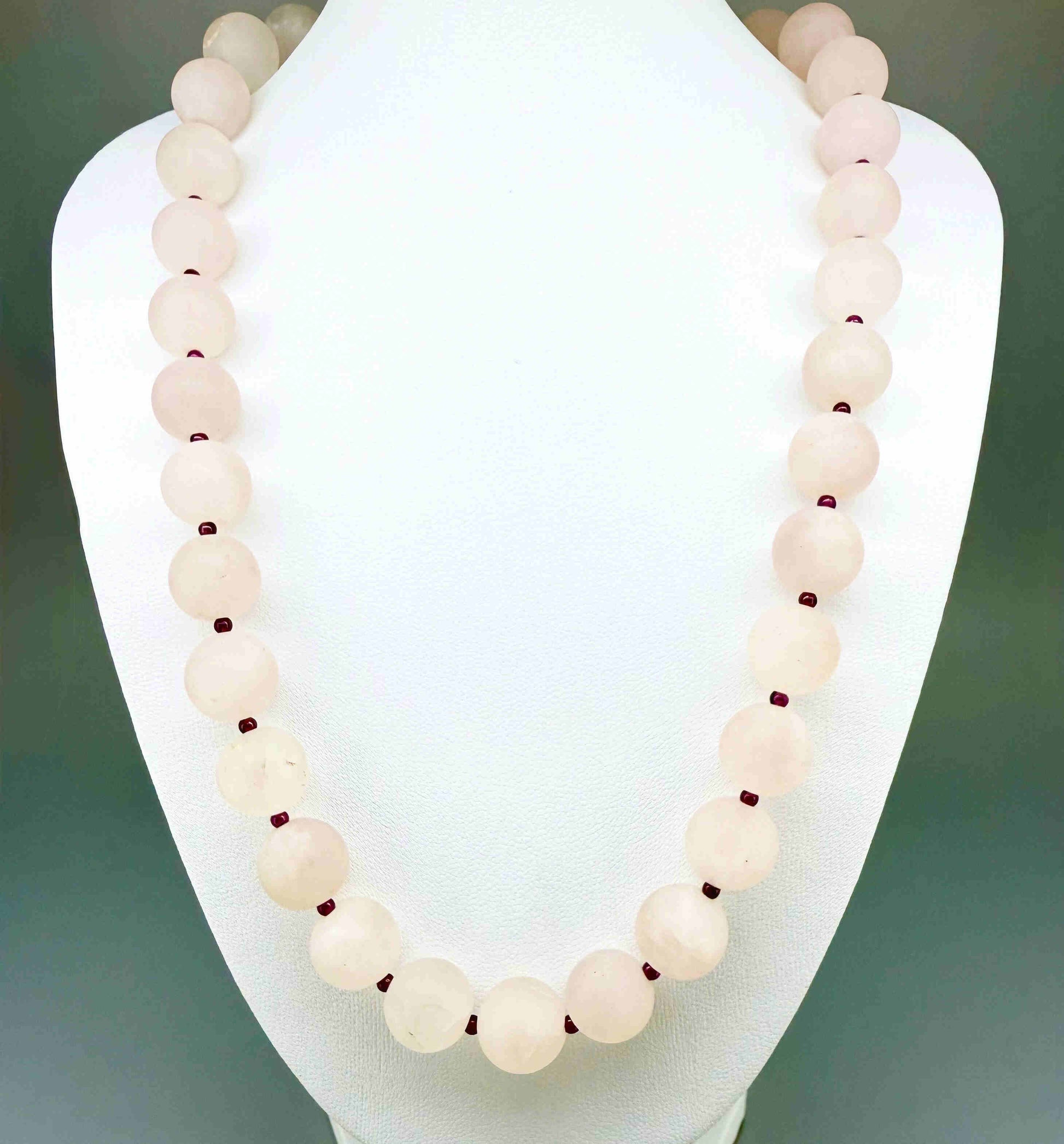 Matte rose quartz beaded necklace, 44 cm long, featuring softly polished natural rose quartz spheres in pale pink tones.