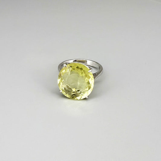 Lemon quartz ring in white gold plated sterling silver, featuring a faceted soft yellow gemstone with brilliant clarity, elegant and timeless design.