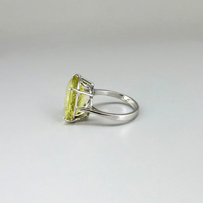 Lemon quartz ring in white gold plated sterling silver, featuring a faceted soft yellow gemstone with brilliant clarity, elegant and timeless design.