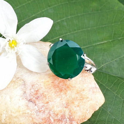 White gold plated sterling silver ring with polished round green agate gemstone, elegant solitaire design with natural shine.
