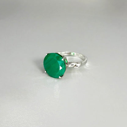 White gold plated sterling silver ring with polished round green agate gemstone, elegant solitaire design with natural shine.